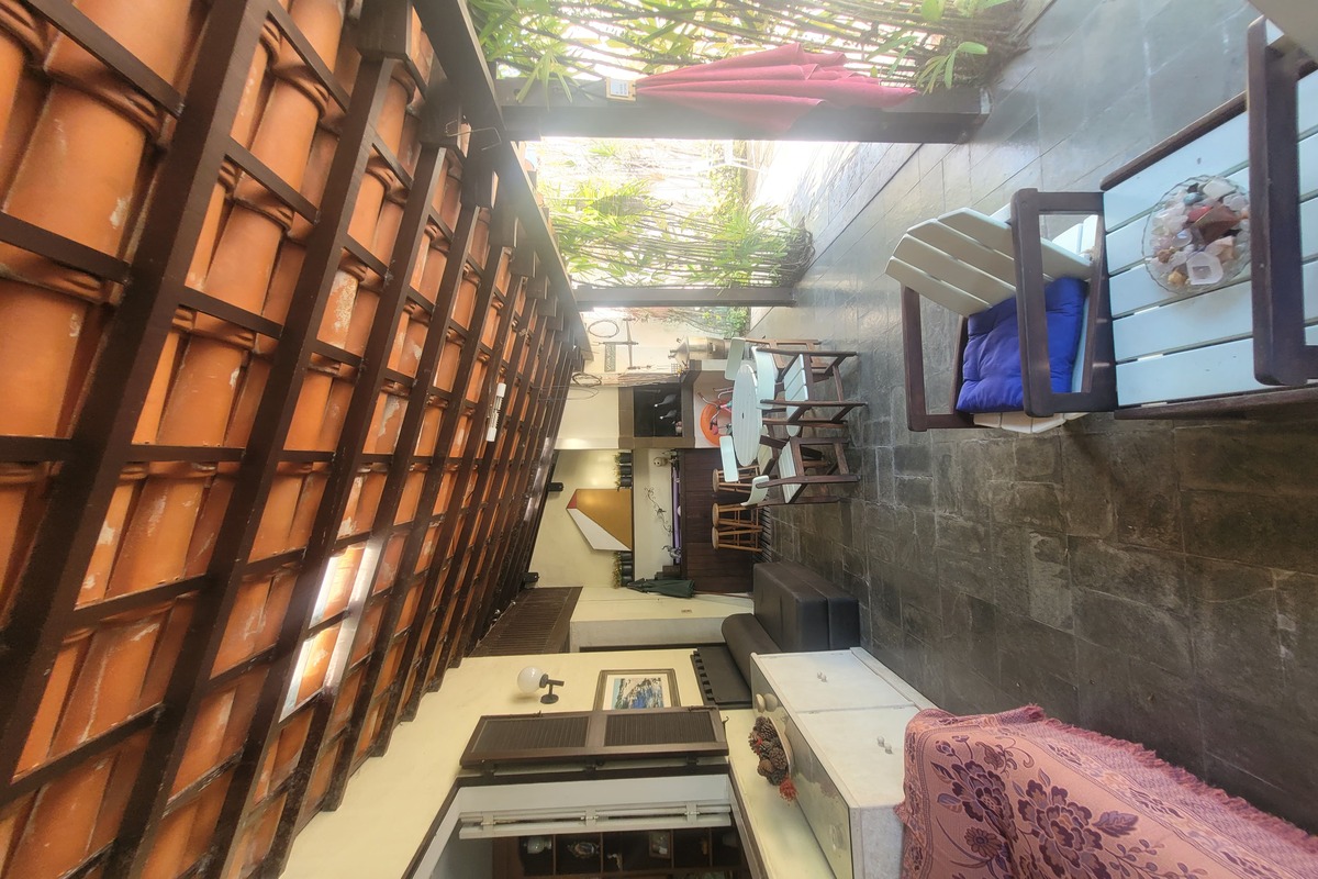 Varanda gourmet com churrasqueira – ideal para receber com privacidade na Barra da Tijuca