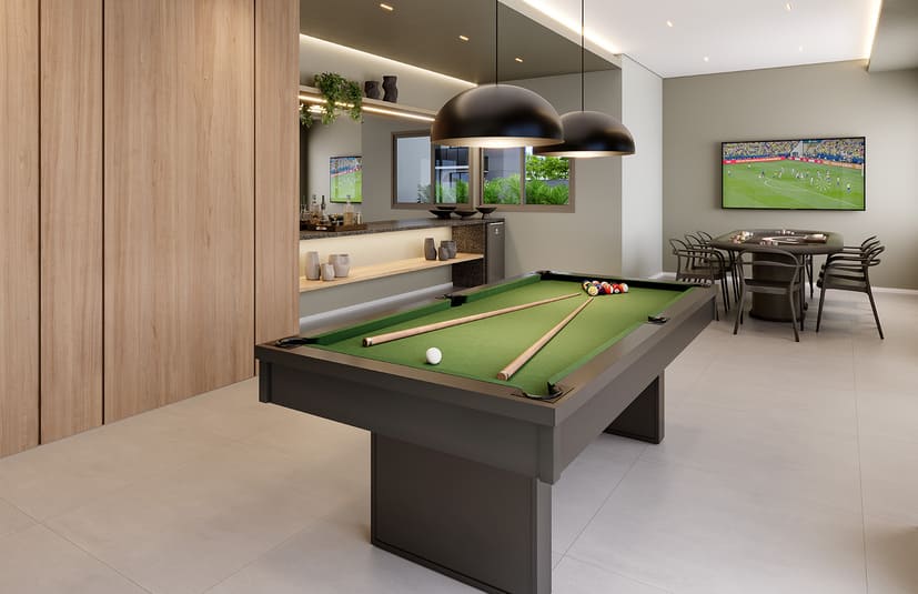 Sports bar do Breeze com mesa de sinuca e telão – espaço de entretenimento para adultos